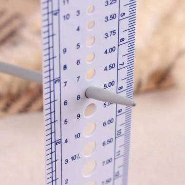 Ruler for measuring the diameter of knitting needles