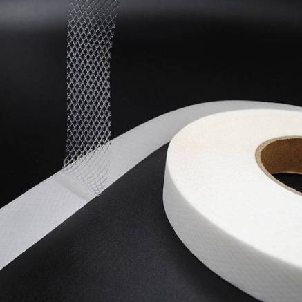Paper-based adhesive spider web for fabric, 1 cm, 1 meter