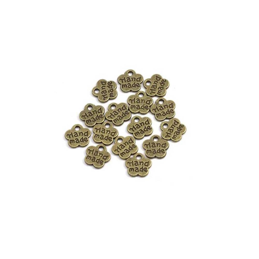 Pendant flower Handmade metal bronze 8*8 mm.