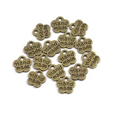 Pendant flower Handmade metal bronze 8*8 mm.