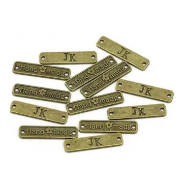 Handmade tag metal bronze 25*7 mm