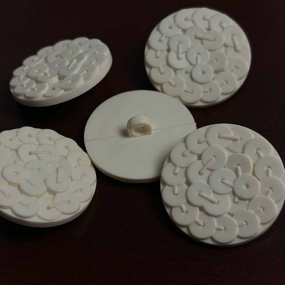 Plastic button with sequins, creamy, 30 mm