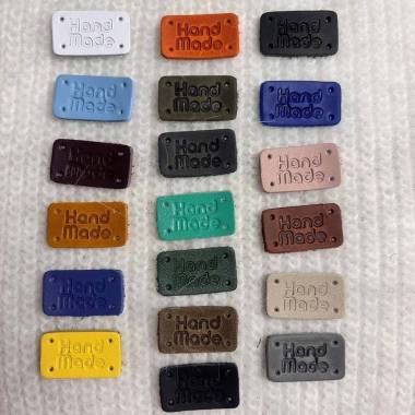 Handmade sew-on tag, leather, green