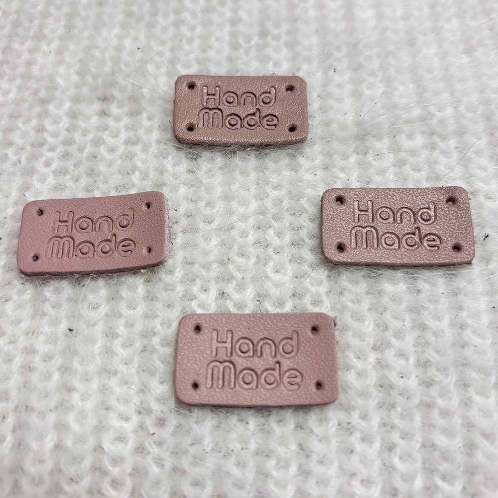 Handmade sew-on tag, leather, powder