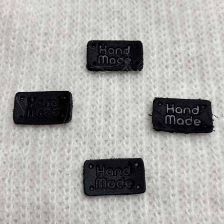 Handmade sew-on tag, leather, black