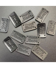 Handmade sew-on tag, leather, black