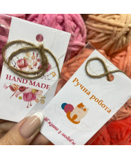 Cardboard tag on handmade jute thread